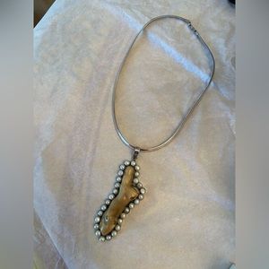 Branch coral set in sterling surrounded by pearls by DZI, a coop for dev country